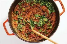  ?? ?? A layer of bean-based chili covered with cornbread makes up the base of this tamale pie.