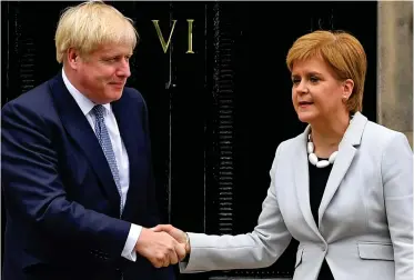  ??  ?? First face-to-face meeting: Boris Johnson and Nicola Sturgeon in Edinburgh yesterday