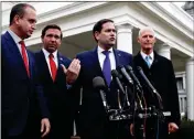  ?? ASSOCIATED PRESS ?? IN THIS JAN. 22 PHOTO, Rep. Mario Diaz-Balart, R-Fla. (from left), Florida Gov. Ron DeSantis, Sen. Marco Rubio, R-Fla., and Sen. Rick Scott, R-Fla., speak to the media after their meeting with President Donald Trump at the White House in Washington.