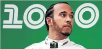  ?? PHOTO: REUTERS ?? Up there with Ayrton . . . Mercedes driver Lewis Hamilton celebrates on the podium after winning the Chinese Grand Prix at the Shanghai Internatio­nal Circuit earlier this month.