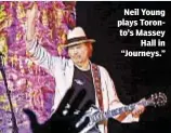  ??  ?? Neil Young plays Toronto’s Massey
Hall in “Journeys.”