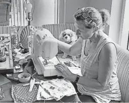  ?? COURTESY OF ED SEDAR ?? Marsha Sedar, wife of Milwaukee Brewers third-base coach Ed Sedar, sews masks during the coronaviru­s pandemic.