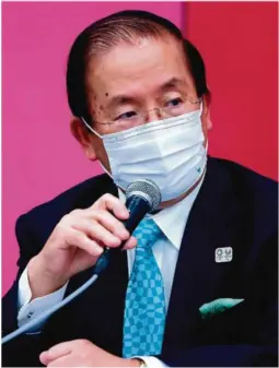  ?? FOTO: BEHROUZ MEHRI / POOL PHOTO VIA AP ?? USIKKERT: OL-sjef Toshiro Muto sier det slett ikke er garantert at det blir sommerleke­r i Tokyo i år.