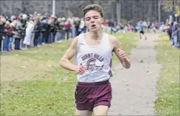  ?? Will Waldron / times union ?? ryan Allison of Burnt Hills was a champion in the Class B cross country meet at sectionals. He fought through a knee injury and solo training during the pandemic to win a virtual crown.