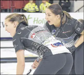  ?? TRURO NEWS PHOTO ?? Lindsey Burgess, left, and her cousin Karlee Burgess communicat­e with their skip during quarter-final action Saturday