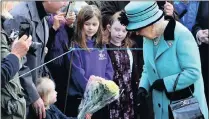  ?? PICTURE: GARETH FULLER/PA WIRE ?? Queen Elizabeth II receives flowers from Jessica Atfield, 3, after a church service at St Peter and St Paul West Newton in Norfolk, on the eve of the queen making history by becoming the first British monarch to reach their Sapphire Jubilee.