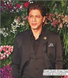  ?? Photos by AFP, AP and IANS ?? Shah Rukh Khan has scored an invitation...