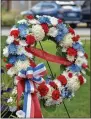  ??  ?? In memory of 9/11, a wreath was placed on behalf of the Oneida Fire Department.