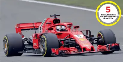  ?? AP ?? Times, Hamilton has won the China Grand Prix Ferrari driver Sebastian Vettel of Germany steers his car during the qualifying session for the Chinese Formula One Grand Prix. —