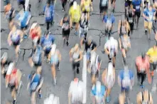  ?? DYLAN BUELL/GETTY IMAGES ?? A Montreal cardiologi­st is reminding runners that heart disease or structural abnormalit­ies of the heart — not running a marathon — is the real cause of cardiac arrest on race day.