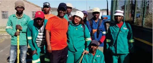  ?? Photo: supplied ?? Makana Municipali­ty Parks and Maintenanc­e Department workers pose on the grounds of the Joza Youth Hub (JYH). The team cut the lawns in anticipati­on of the JYH Open Day on Saturday.