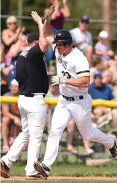  ?? PHOTO BY ANNIE SAKKAB ?? Sean Reilly, then a Kitchener Panther, celebrates a 2015 home run as he rounds the bases.