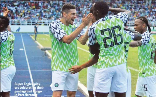  ??  ?? Super Eagles players celebratin­g their goal against Congo in Port Harcourt