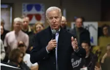  ?? AP ?? ON THE CAMPAIGN TRAIL: Democratic presidenti­al candidate former Vice President Joe Biden speaks with local residents in Carroll, Iowa, on Sunday.