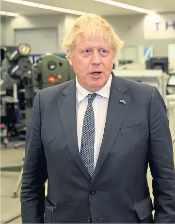  ?? ?? MISSION: Prime Minister Boris Johnson at Thales weapons manufactur­er in Belfast during a visit to Northern Ireland for talks with Stormont parties.