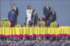  ?? AP file photo ?? Ethiopia’s Prime Minister Abiy Ahmed (right), First Lady Zinash Tayachew, center, and Djibouti’s President Ismail Omar Guelleh (left), attend Abiy’s inaugurati­on ceremony after he was sworn in for a second five-year term, in the capital Addis Ababa, Ethiopia on Oct. 4.