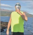  ?? 01_B02dook02 ?? One of the founding dookers, Sean Henry, owner of the Douglas Hotel, was the first into the water with his mask in honour of his unwell friend.