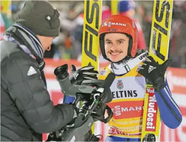  ??  ?? Richard Freitag konnte sich in Oberstdorf gut gelaunt von der TV-Kamera einfangen lassen.