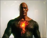  ?? IMAGE COURTESY WARNER BROS. PICTURES ?? This image released by Warner Bros. Pictures shows Dwayne Johnson in a scene from “Black Adam.”
