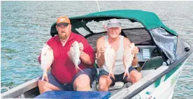  ?? Picture / Paul Thomas ?? John Moran (right) and his fishing mate, the late Tiny Coe, were often successful fishing the shallows off Kawakawa Bay in the early morning.