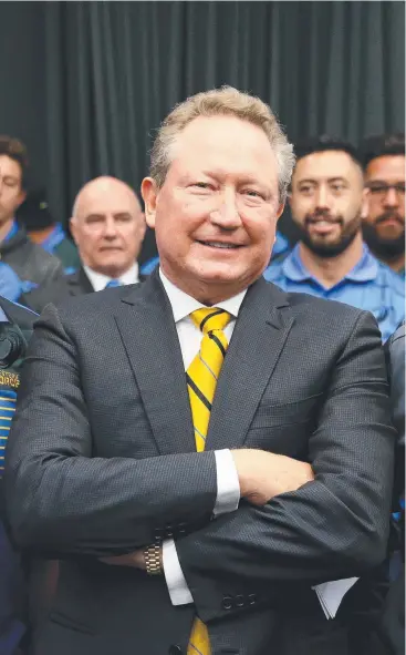  ?? Picture: COLIN MURTY ?? REASON TO SMILE: Andrew Forrest, pictured with Western Force staff, players and board members, is confident the ARU will back his new competitio­n.