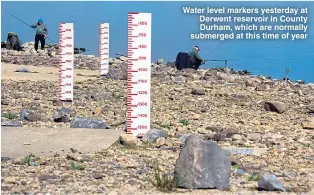  ?? Pictures: PAUL KINGSTON/NNP ?? Water level markers yesterday at Derwent reservoir in County Durham, which are normally submerged at this time of year