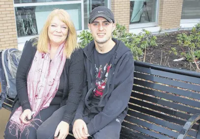  ?? LYNN CURWIN/TRURO NEWS ?? Curtis Coley and his mother, Wendy, value the time they’re able to spend together. At this time last year, Curtis was in a coma and his chances of survival were slim.