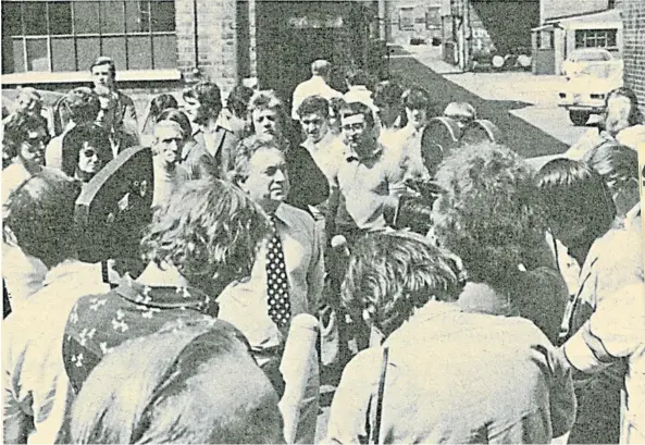  ?? ?? After Eric Varley pulled the plug on NVT support, it was obvious that the firm would have to downsize – and first in the firing line was the workforce at its Wolverhamp­ton factory, outside which a union leader gives his views while TV crews and other reporters gather around.