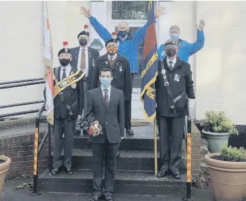  ??  ?? Daft as a brush founder Brian Burnie (middle back row), with veterans outside the care home where Len is living.