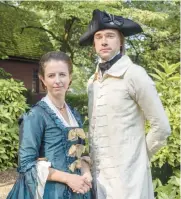  ?? COLONIAL WILLIAMSBU­RG ?? A dining program at Colonial Williamsbu­rg, Wine Dinner with a Nation Builder, allows people to buy tickets and eat dinner with historical interprete­rs and discuss Colonial life. Katharine Pittman, left, and Daniel Cross portray Martha and George Washington. The events run through December.