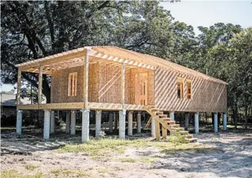  ?? SERGIO FLORES/THE NEW YORK TIMES ?? A home under constructi­on this month in the Kashmere Gardens neighborho­od of Houston.