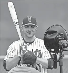  ?? SPORTS ?? Mets third baseman David Wright poses for a photo before a spring training game against the Tigers on March 9 in Port St. Lucie, Fla. STEVE MITCHELL/USA TODAY