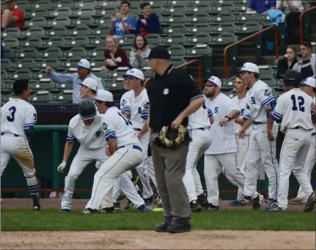  ?? BY JOE BOYLE JBOYLE@DIGITALFIR­STMEDIA.COM @BOYLERALER­TTROY ON TWITTER ?? Saratoga celebrates after Nate Chudy’s single tied things in the top of the seventh against Shen in 2019.