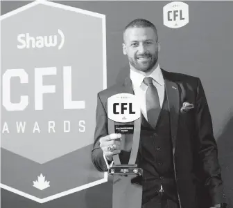  ?? NATHAN DENETTE, THE CANADIAN PRESS ?? Eskimos quarterbac­k Mike Reilly led the CFL in passing yards and Thursday in Ottawa he was named the league’s most outstandin­g player.