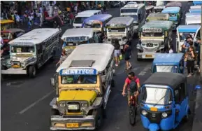  ?? AFP/VNA Photo ?? Jeepneys face an existentia­l threat from a plan to replace them with modern mini-buses.