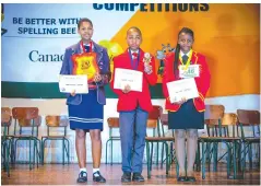  ?? ?? Spelling Bee winners display their certificat­es recently