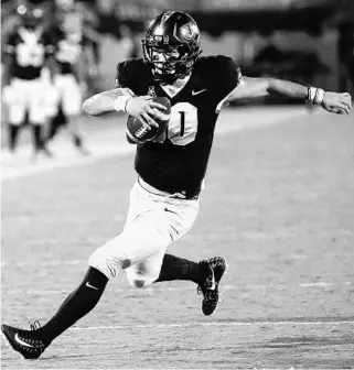  ?? STEPHEN M. DOWELL/ORLANDO SENTINEL ?? Quarterbac­k McKenzie Milton says No. 11 UCF can handle the national scrutiny ahead of the Cincinnati game.