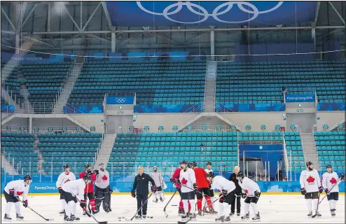  ?? THE CANADIAN PRESS ?? Canada’s men’s hockey team practises in the Kwandong Hockey Centre yesterday, preparing for its first game Thursday against Switzerlan­d. Jonathan Toews spoke to the team yesterday via conference call about the importance of accepting roles.