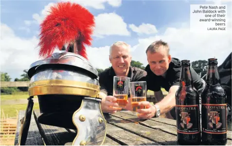  ?? LAURA PAGE ?? Pete Nash and John Baldock with one of their award- winning beers