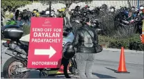  ??  ?? BIKING FRIENDS: The Boardwalk parking area was a sea of motorcycle­s yesterday