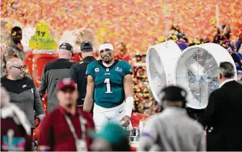  ?? Ross D. Franklin/Associated Press ?? Philadelph­ia quarterbac­k and Channelvie­w product Jalen Hurts completed 27 of 38 passes for 304 yards and a touchdown and rushed 15 times for a Super Bowl-record 70 yards and three TDs.