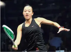  ??  ?? On a roll: Low Wee Wern downs Hong Kong’s Lee Ka Yi to win the Singapore Open title on Saturday.