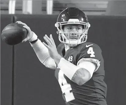  ?? CAROLYN KASTER/AP ?? Washington quarterbac­k Taylor Heinicke looks to throw against the Panthers on Sunday in Landover. Heinicke relieved Dwayne Haskins and completed 12 of 19 passes for 137 yards and a touchdown.