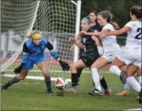  ?? BARRY TAGLIEBER - FOR DIGITAL FIRST MEDIA ?? Phoenixvil­le’s goalie Ella Stout makes a stop on Villa Maria’s Maddie Byrne and Grace McLees.