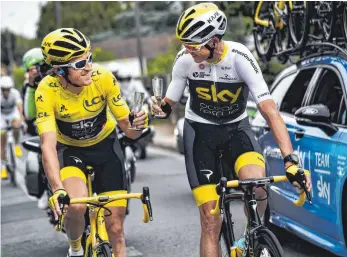  ?? FOTOS: AFP ?? Geraint Thomas aus Wales hat die 105. Tour de France gewonnen und Chris Froome (re.) entthront.