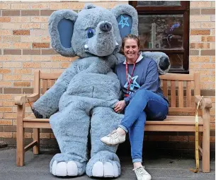  ?? ?? ● Rhian Mannings MBE, founder and chief executive of 2wish, with the charity’s mascot