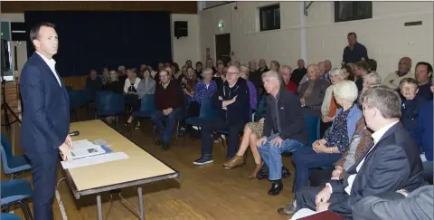  ??  ?? Deputy John Brady addressing a recent public meeting on the decision to close Donard Post Office.