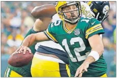  ?? [JEFFREY PHELPS/THE ASSOCIATED PRESS] ?? A blockbuste­r deal brought a new wrinkle to the NFL’s oldest rivalry. The Bears visit Aaron Rodgers, above, and the Packers at Lambeau Field on Sunday night.