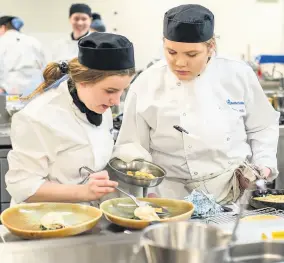  ??  ?? Chefs taking part in the contest at Bath College; above right, judges Tracey Chapman and Scott Lucas