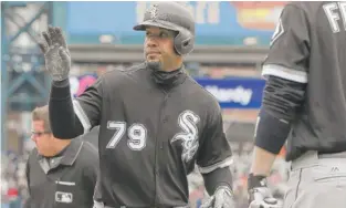  ?? | CARLOS OSORIO/ AP ?? Jose Abreu waves to taunting fans after hitting a home run in the eighth inning.